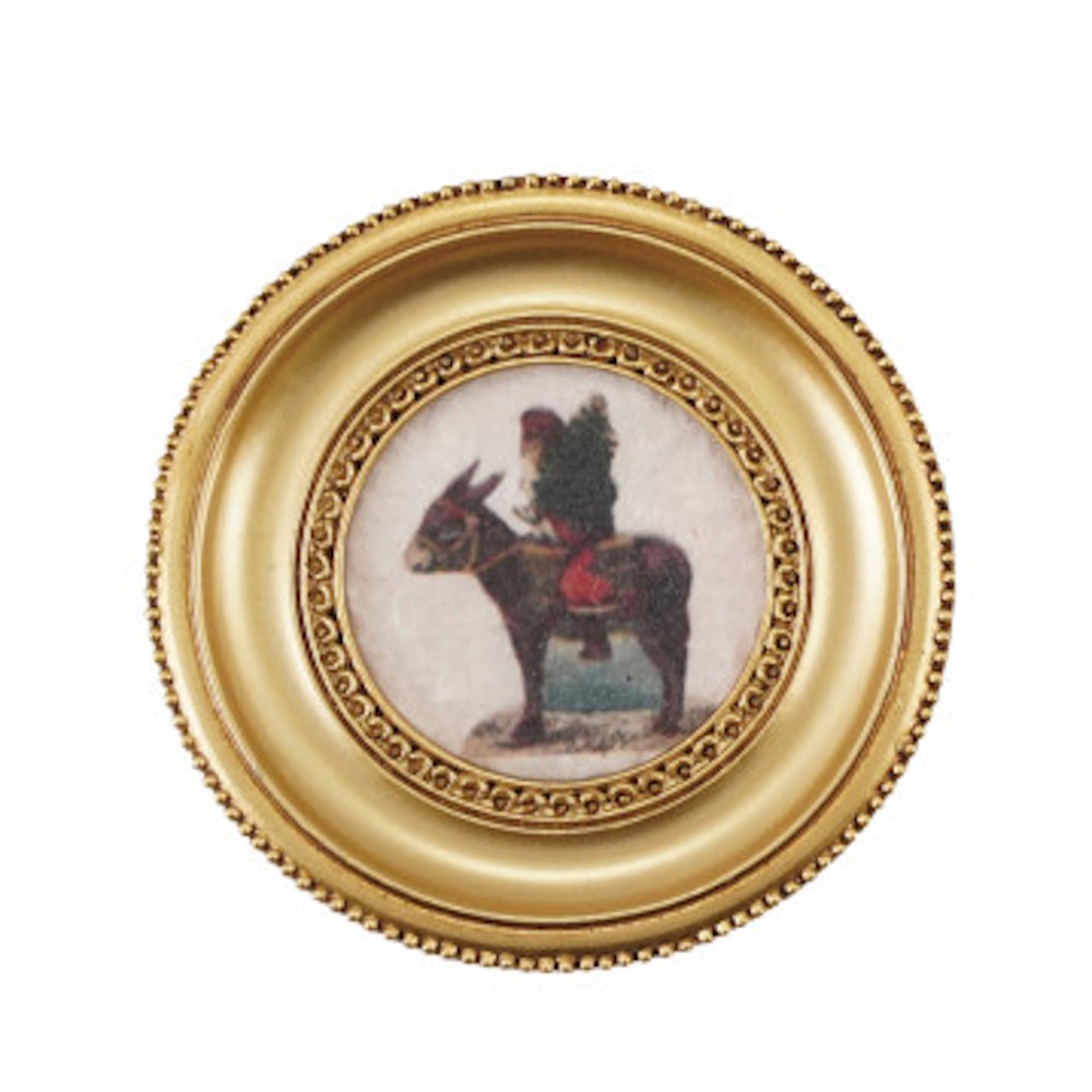 Small circular gold frame magnet with vintage illustration of a figure riding a donkey.