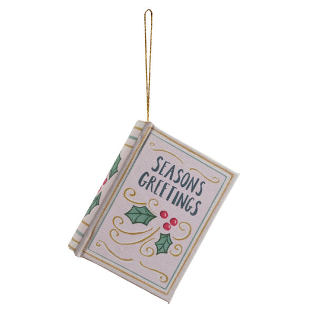 Small book-shaped Christmas ornament with hanging string and "Seasons Greetings" holiday design.
