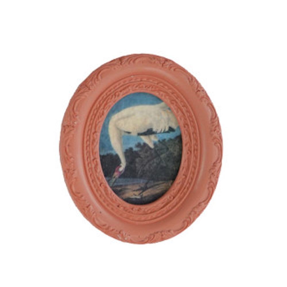 Oval dusty pink framed art magnet featuring a vintage white swan print.