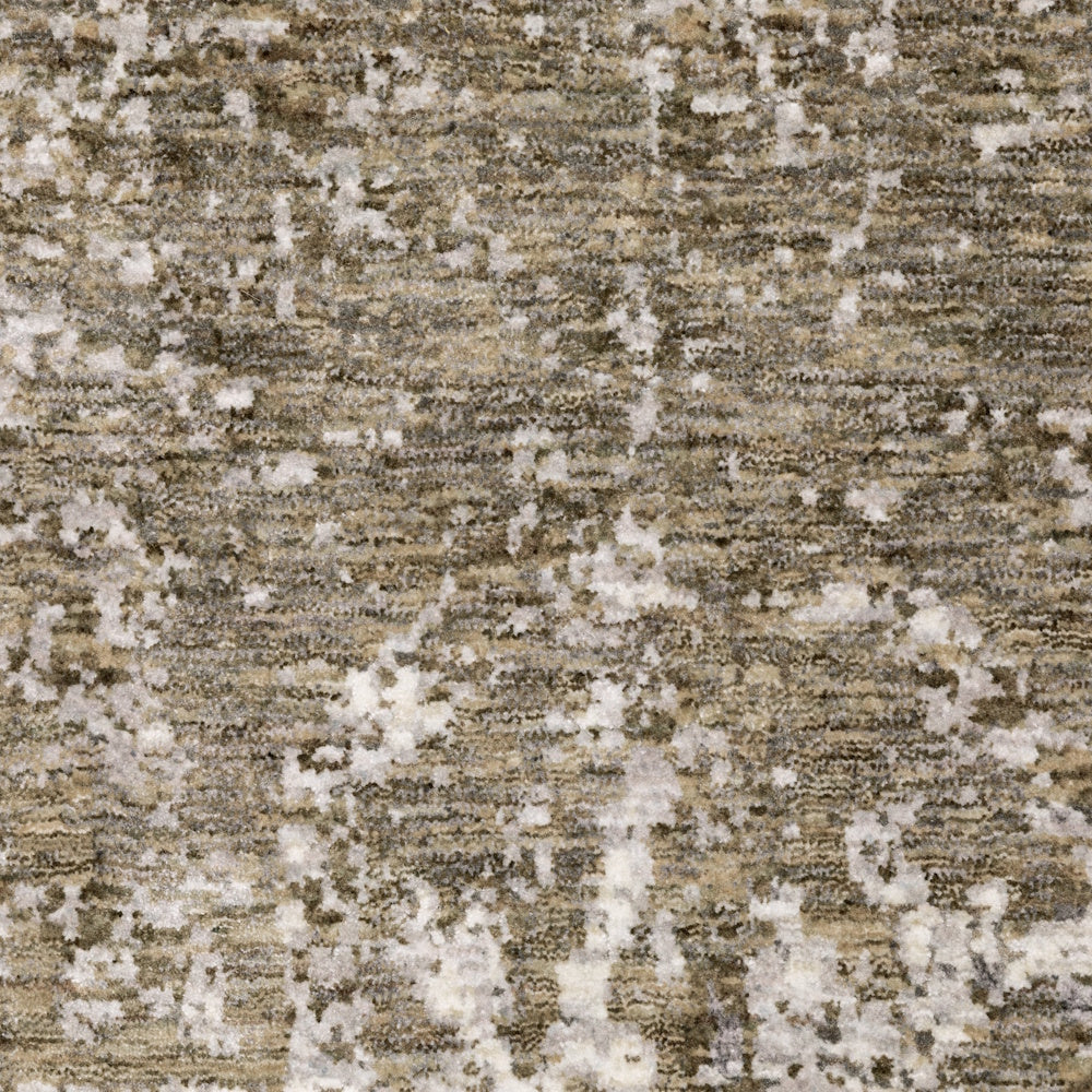 Extreme close-up of the gray, taupe, and cream area rug highlighting the detailed texture of the distressed pattern.
