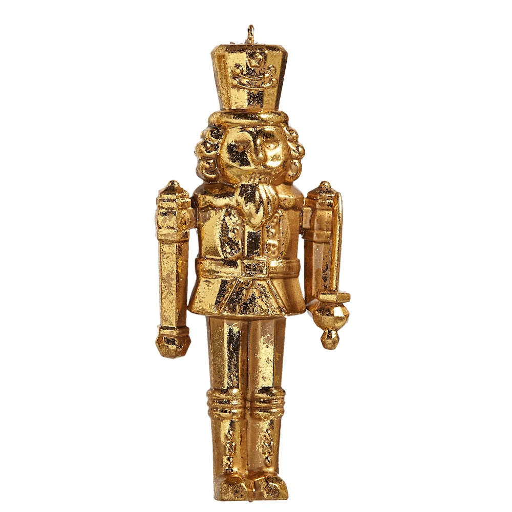 Gold nutcracker Christmas tree ornament with a textured finish and holding a sword.