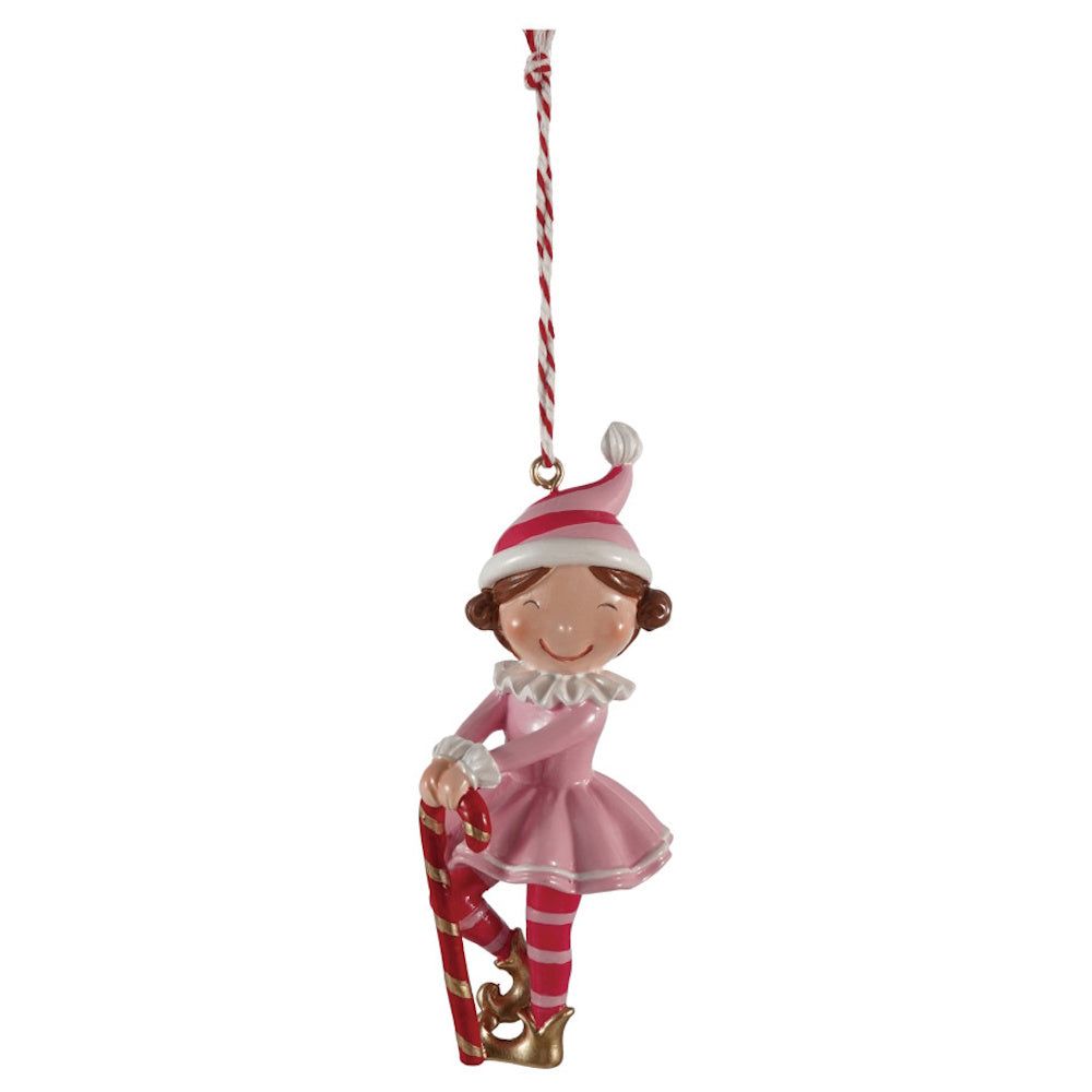 Festive elf ornament wearing a pink dress, striped hat, and tights while holding a candy cane.