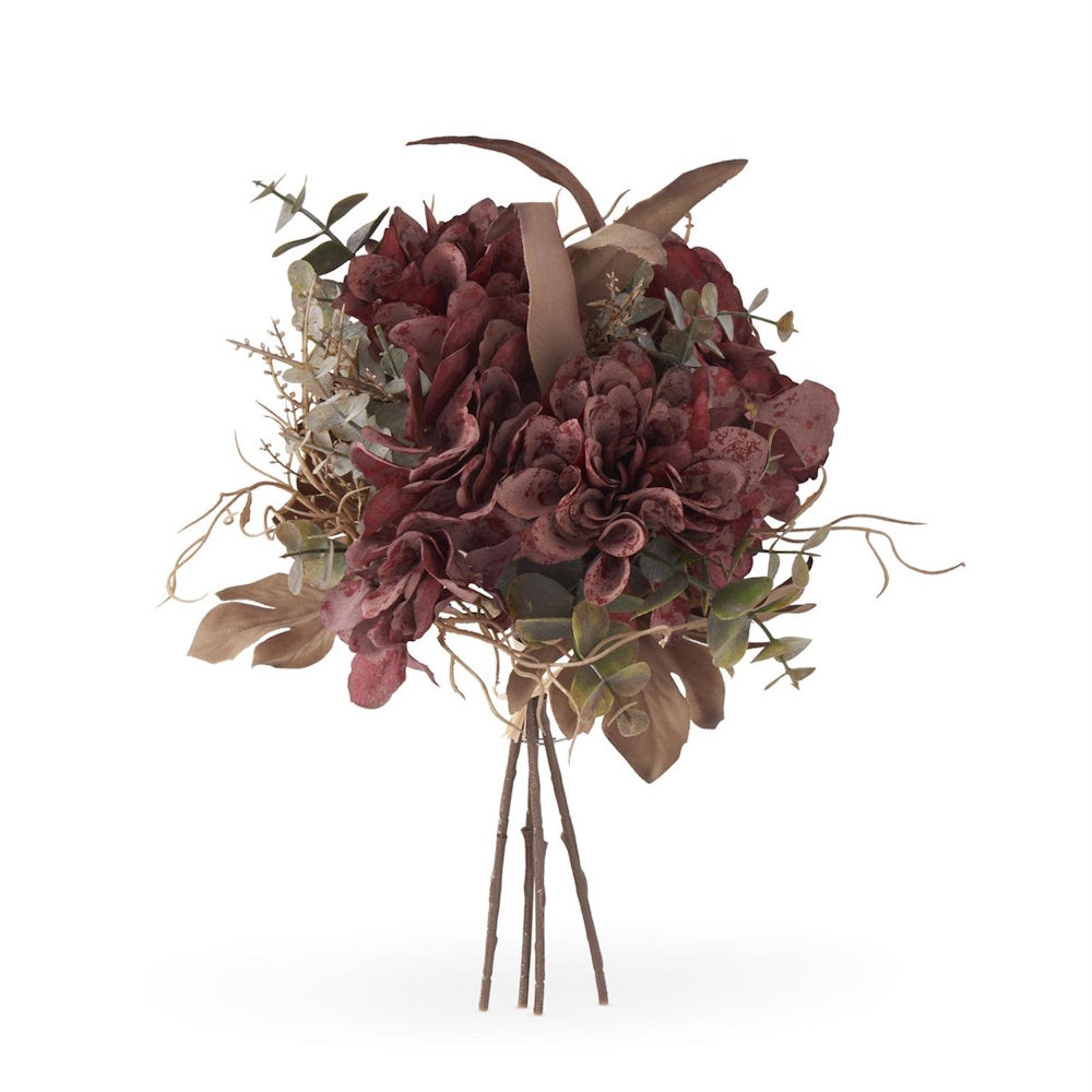 Bundle of artificial burgundy blooms, muted green eucalyptus, and dried-look foliage tied at the stems.