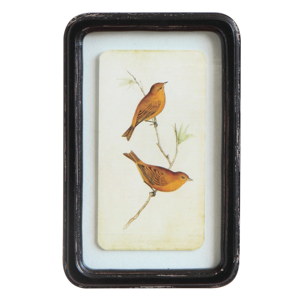 Wood framed glass wall decor with floating art of two orange birds perched on a branch.