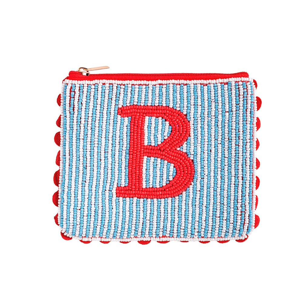 Beaded zip pouch with blue and white stripes, a red initial letter "B", and red pom-pom trim.