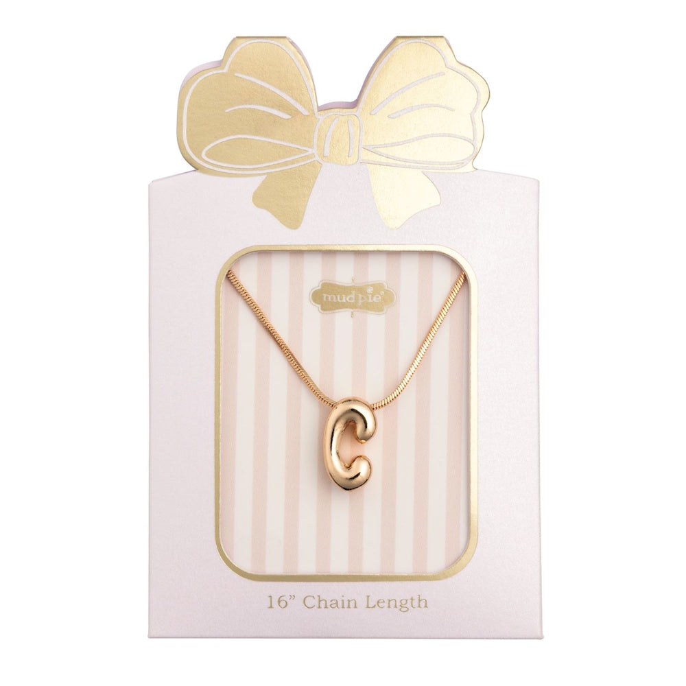 Gold puff letter "C" initial pendant necklace displayed on a gift-shaped card.