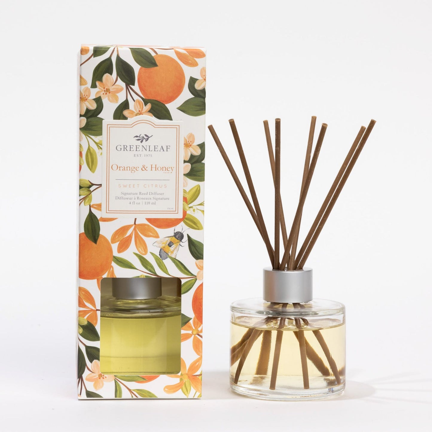 Greenleaf Orange & Honey diffuser with packaging on a white background