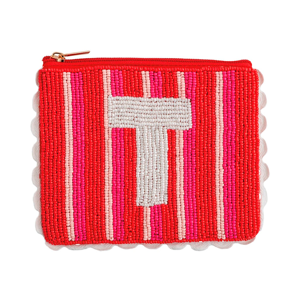 Beaded pouch featuring a white initial "T" on a red and pink striped pattern.