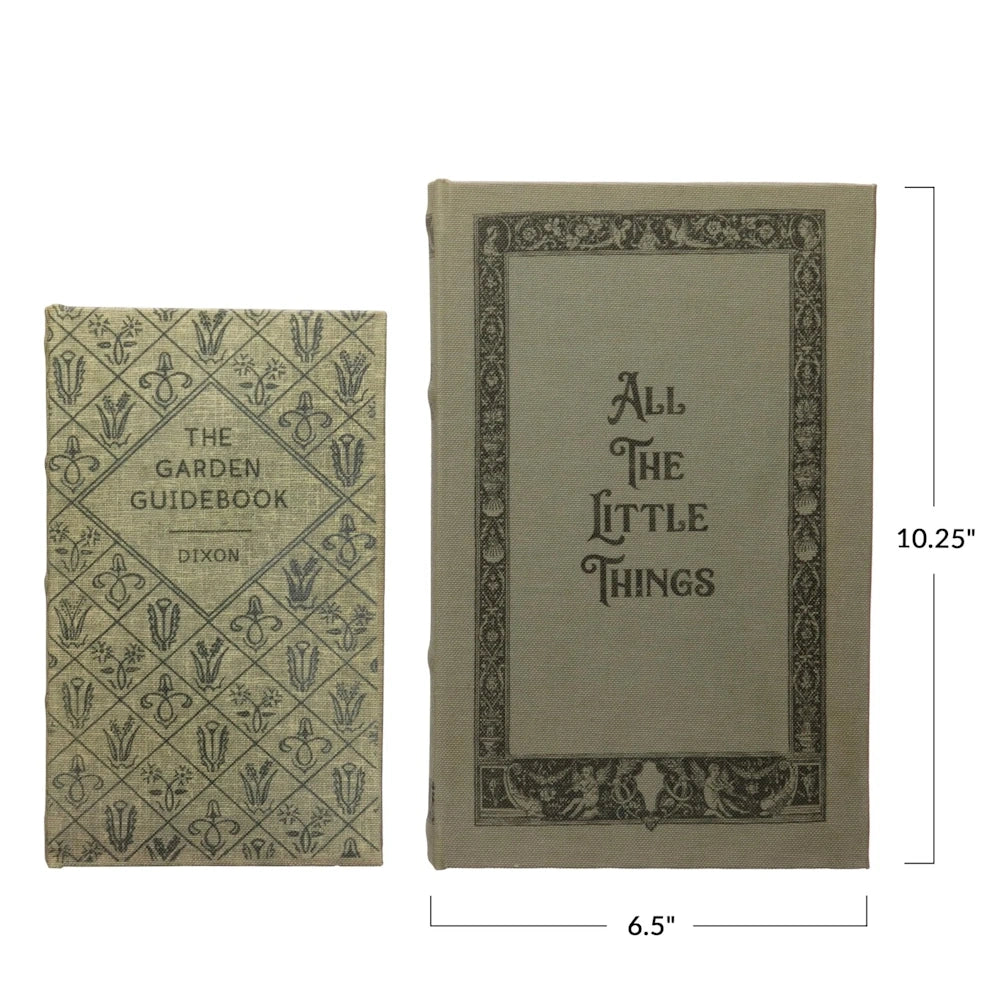 Vintage-style canvas book storage boxes, 10.25" x 6.5", titled "The Garden Guidebook" and "All The Little Things."