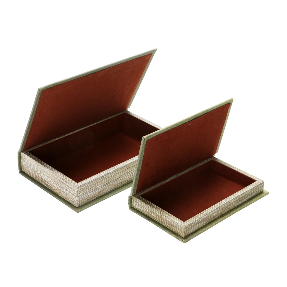 Two vintage-style green book storage boxes with open lids, red velvet lining, and distressed wood-grain edges on white.