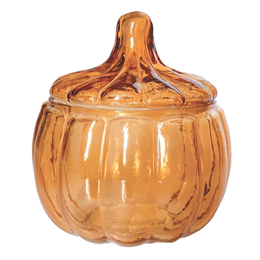 Amber glass pumpkin-shaped jar with a matching stem lid.