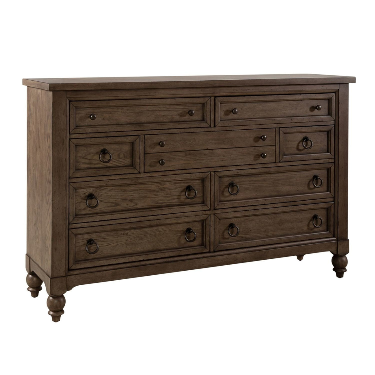 Americana farmhouse 9-drawer wooden dresser with antiqued ring pulls, round knobs, and turned feet.