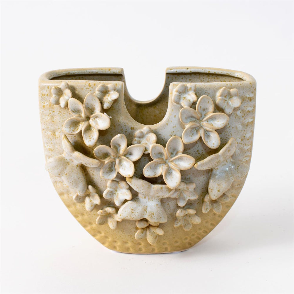 Beige ceramic vase with 3D floral and butterfly designs, featuring a speckled glaze and a unique u-shaped rim.
