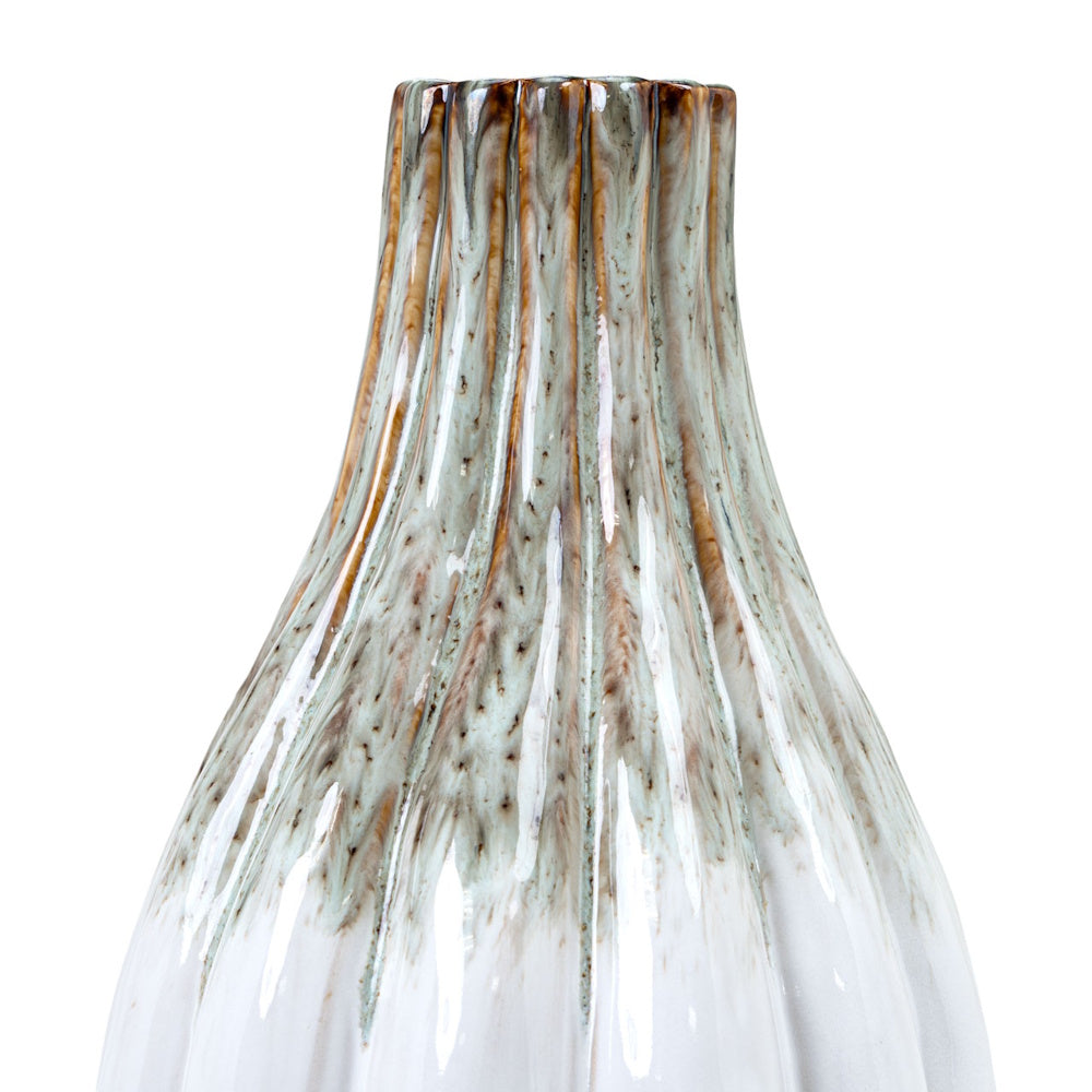 Close-up of the Audrix tall vase featuring a white reactive glaze with vertical brown and green textured drips.