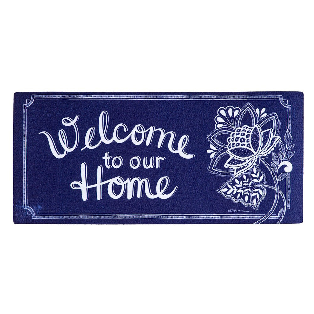 Blue doormat with a white border, a large floral design, and the text "Welcome to our Home."