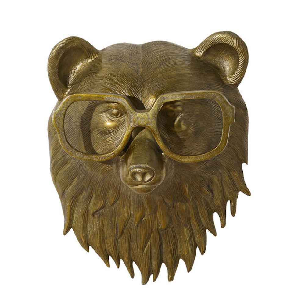 Brass bear head wall mount wearing large thick-rimmed glasses, isolated on a white background.