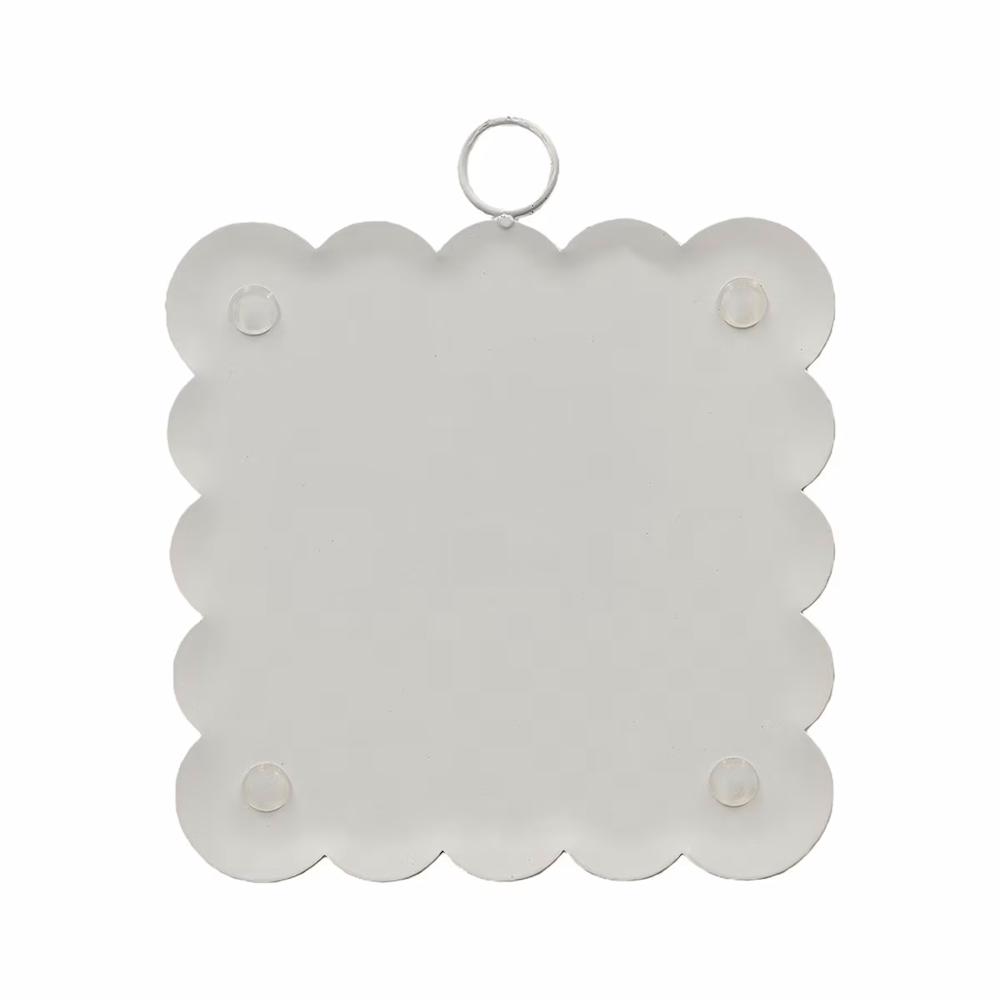 Back view of the white Santa art plaque showing a plain metal design with a hanging ring.