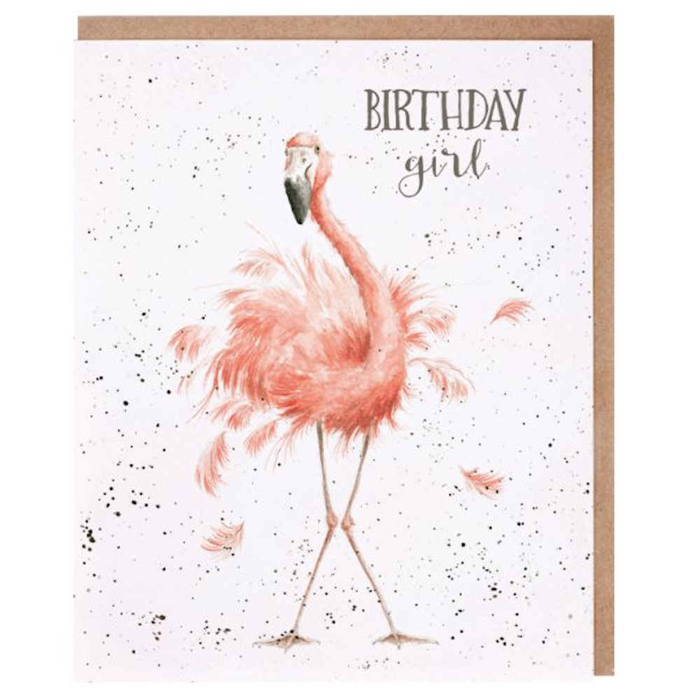 Watercolor illustration of a pink flamingo with "Birthday Girl" text and black speckles on a white greeting card.