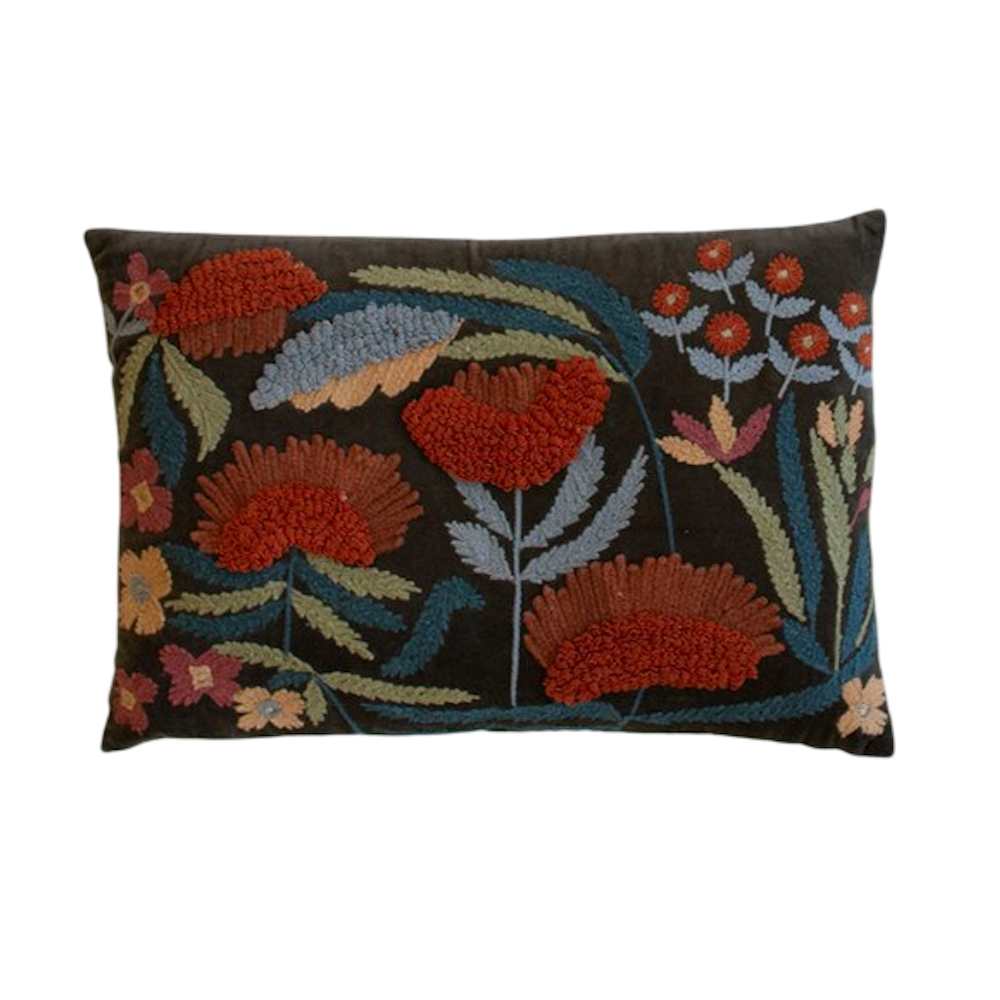 Rectangular dark grey throw pillow featuring colorful, textured botanical embroidery.