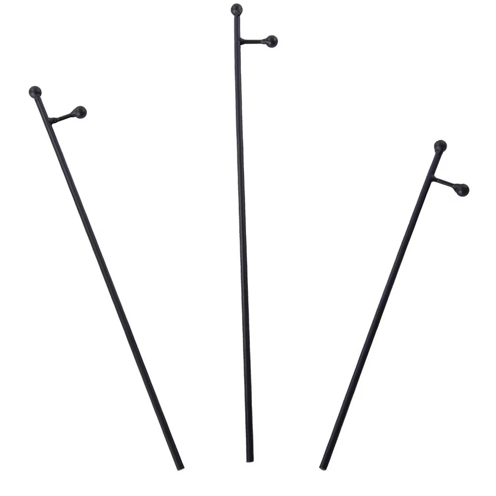 Front view of three black metal charm display stakes arranged separately.