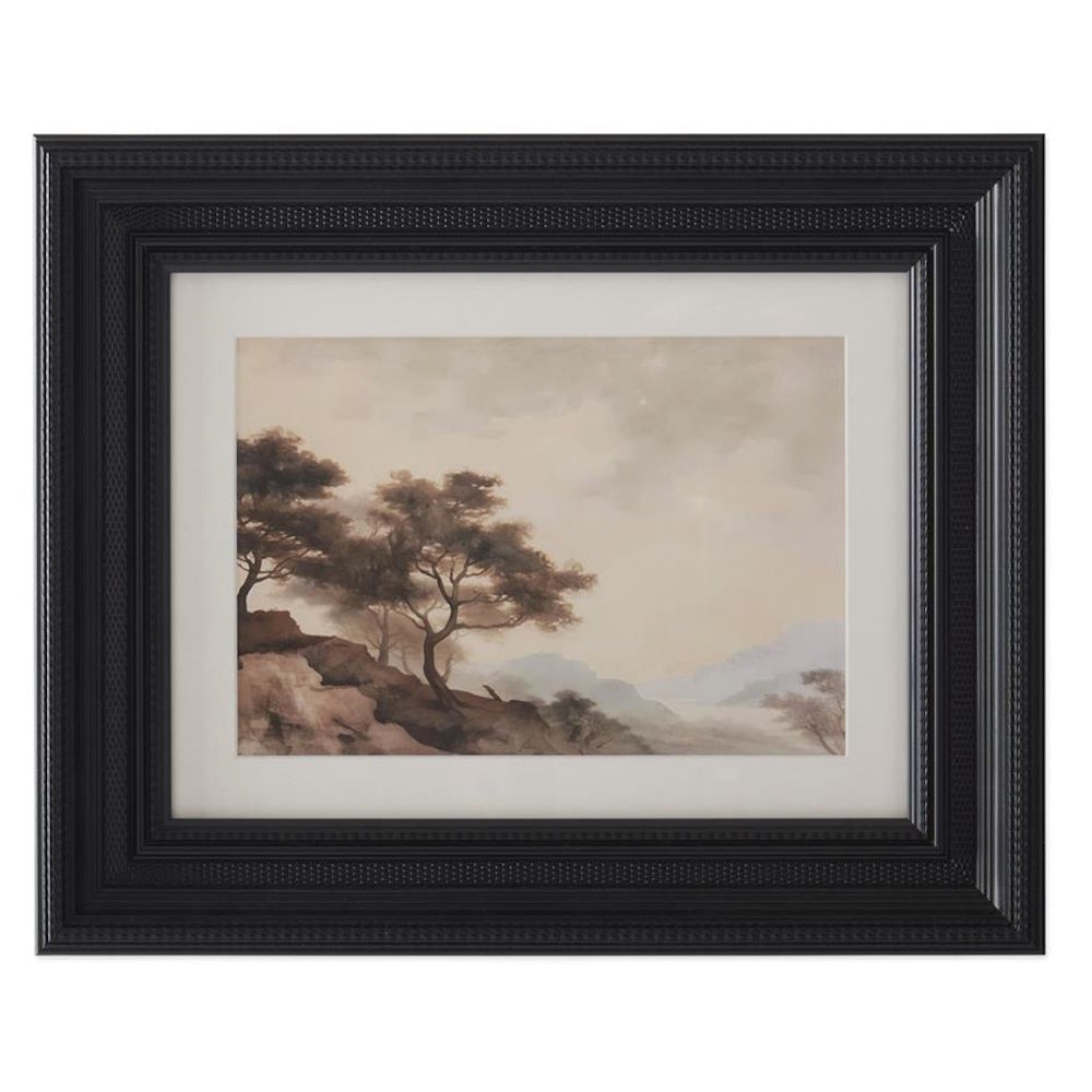 Framed watercolor landscape painting featuring trees on a rocky hillside under a muted sky in an ornate black frame.