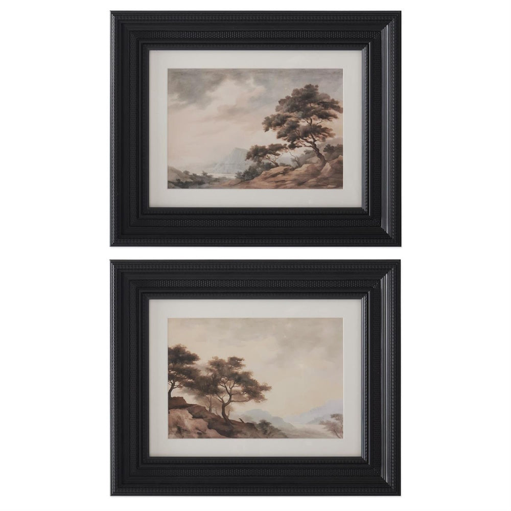 Two framed watercolor landscape prints featuring trees and mountains in ornate black frames for wall decor.
