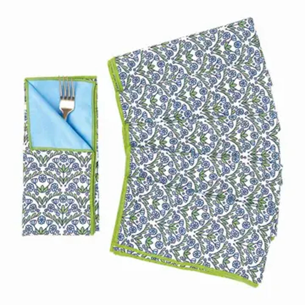 Blue and green floral pattern dinner napkins with a light blue lining and green trim, featuring a silver fork.