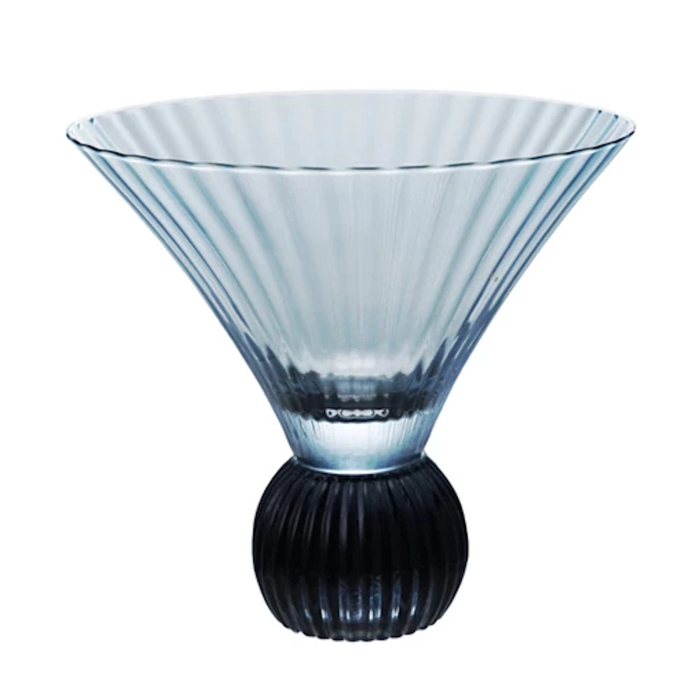 Blue pleated glass martini glass featuring a wide conical bowl and a dark, textured spherical base.