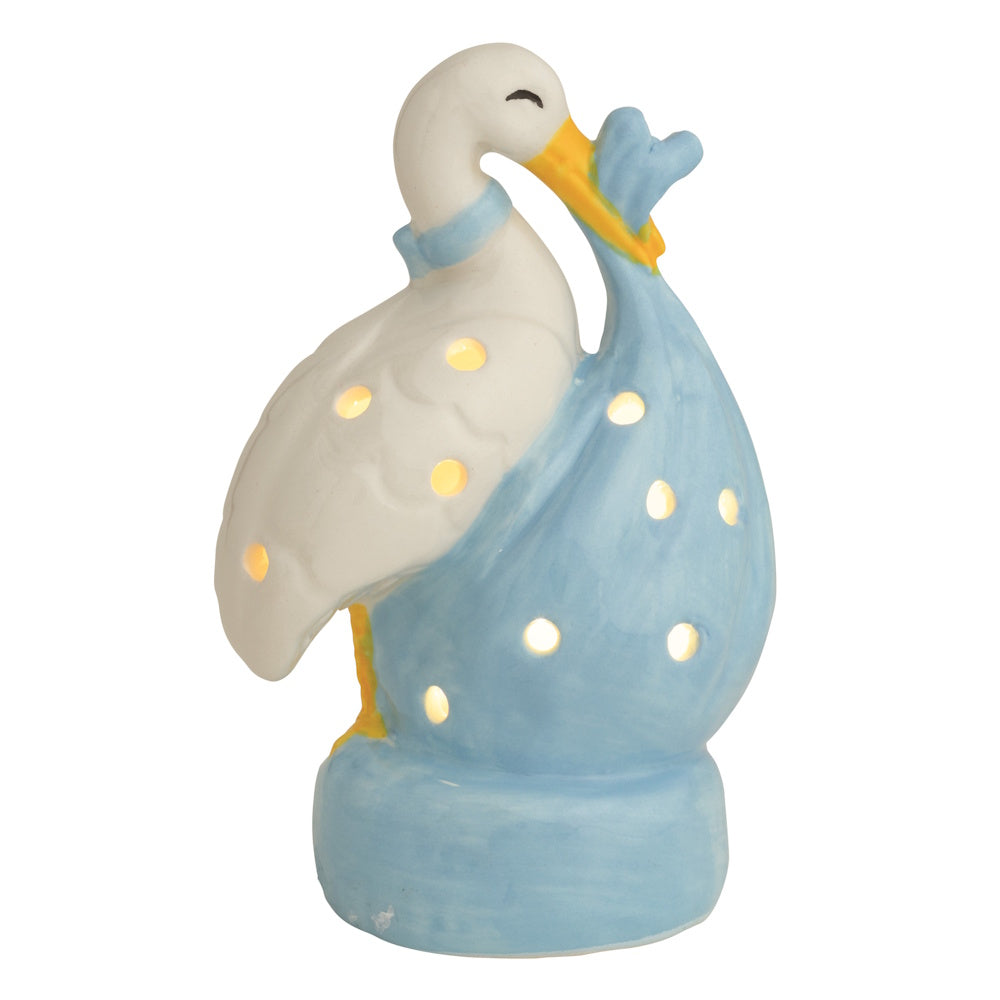 Ceramic light-up stork figurine carrying a blue bundle. Decorative nursery sitter with glowing cutout details.