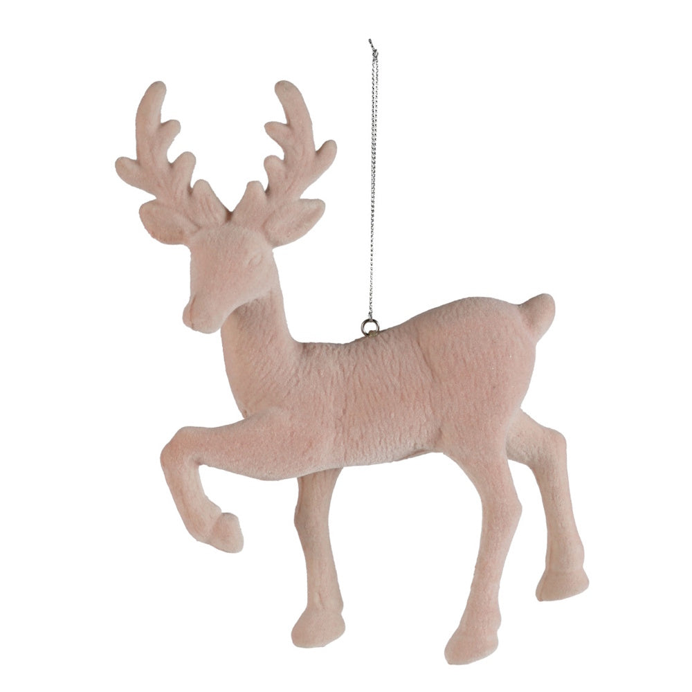 Blush pink flocked deer ornament with antlers, hanging from a thin silver string.