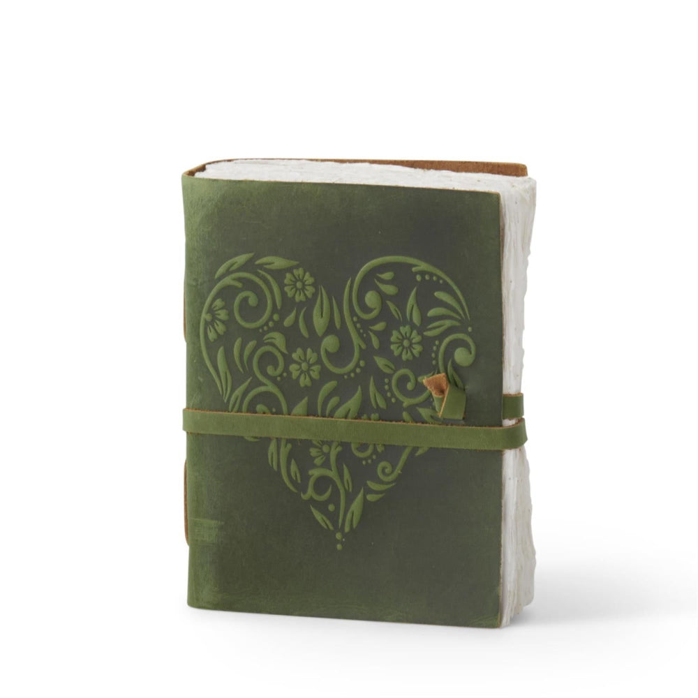 Handcrafted green leather journal with an embossed floral heart design and rustic deckle-edge paper.