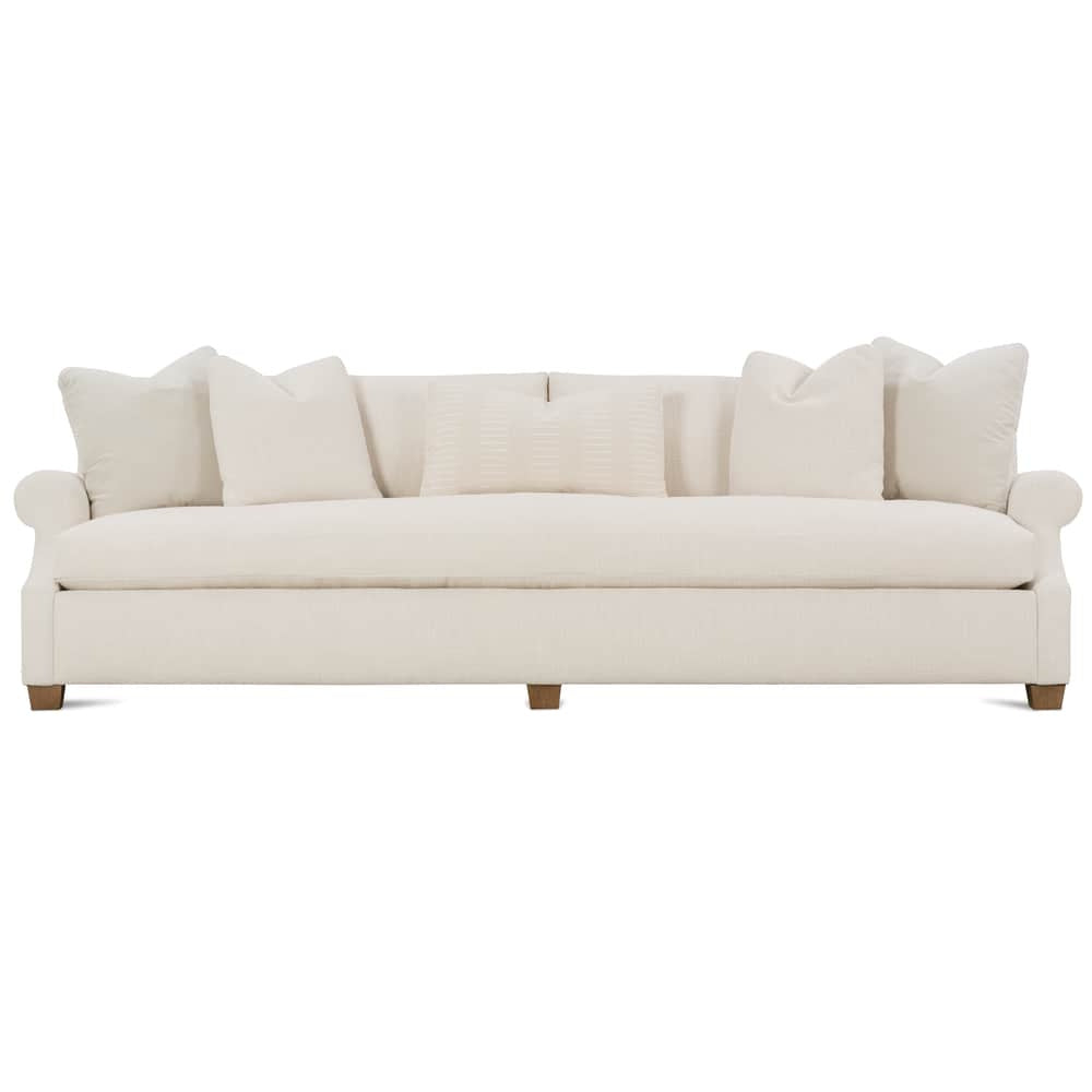 Modern cream fabric Bristol sofa with rolled arms and accent pillows on a white background.
