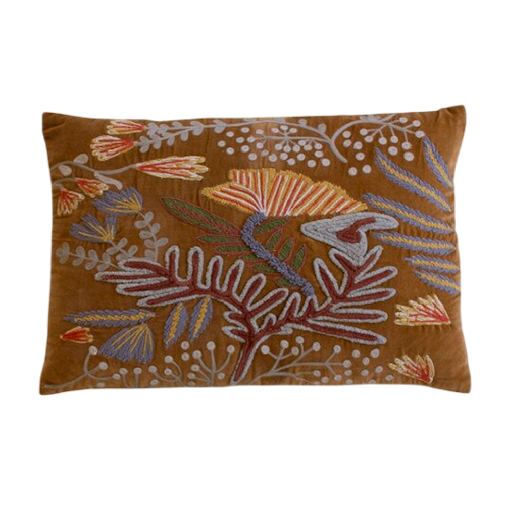 Rectangular brown velvet throw pillow decorated with colorful embroidered flowers and vines.