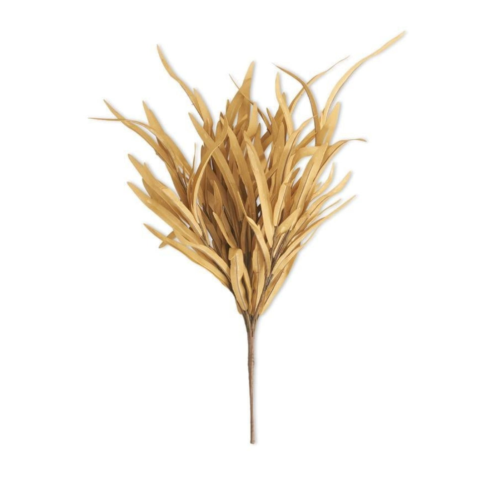 Faux light brown decorative grass stem with long, narrow blades on a white background.