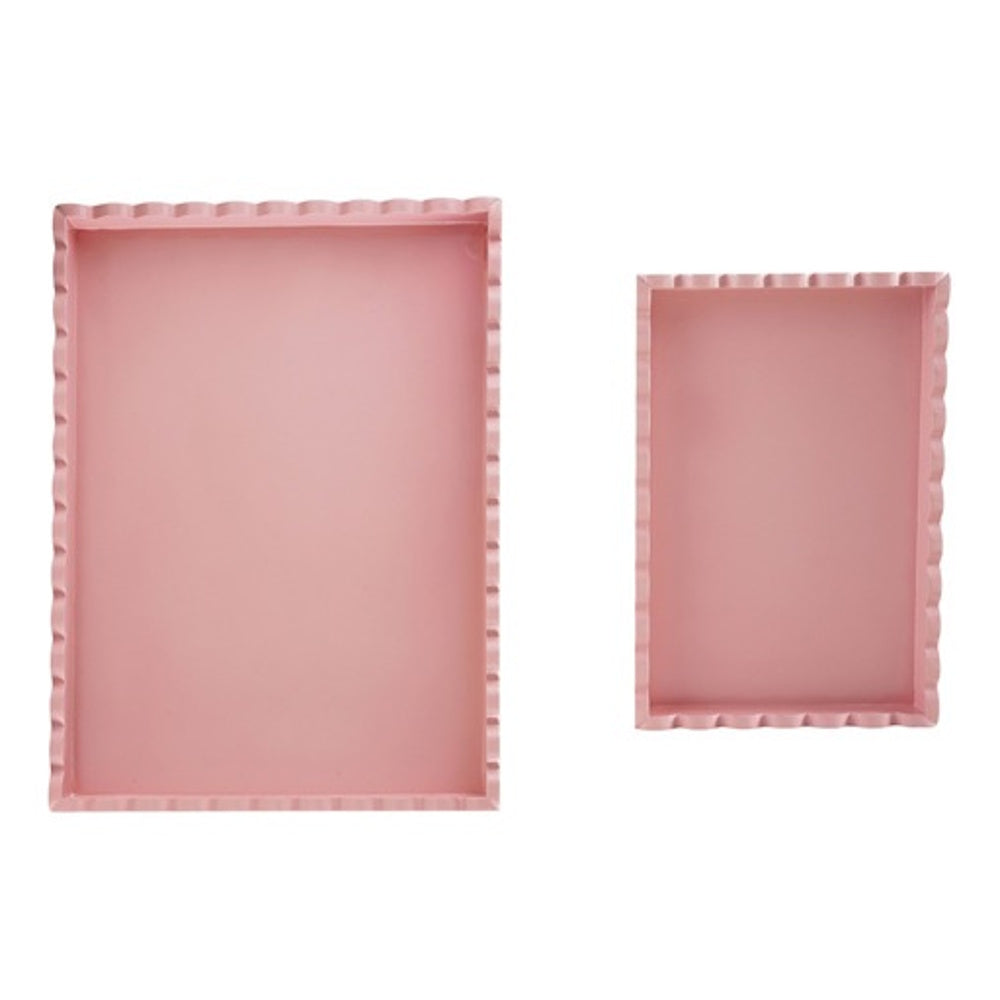 Two pink rectangular trays in different sizes featuring scalloped edges, viewed from above.