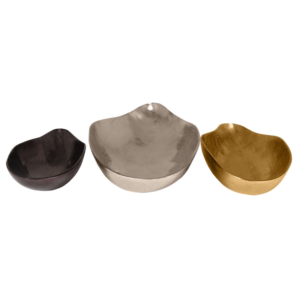 Set of three nesting-style organic-shaped metal trays in dark bronze, silver, and gold finishes on a white background.
