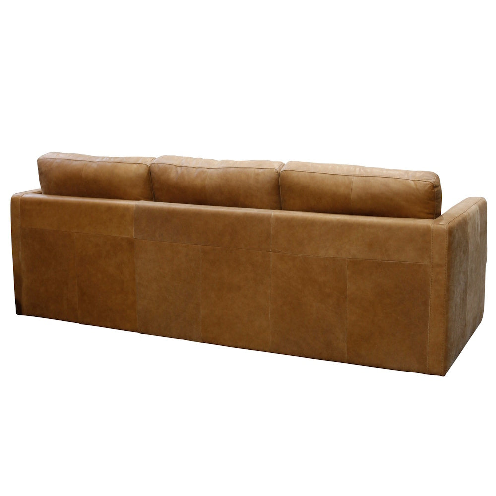 Back view of caramel genuine Italian leather sofa with clean panel detailing and modern box arm design.