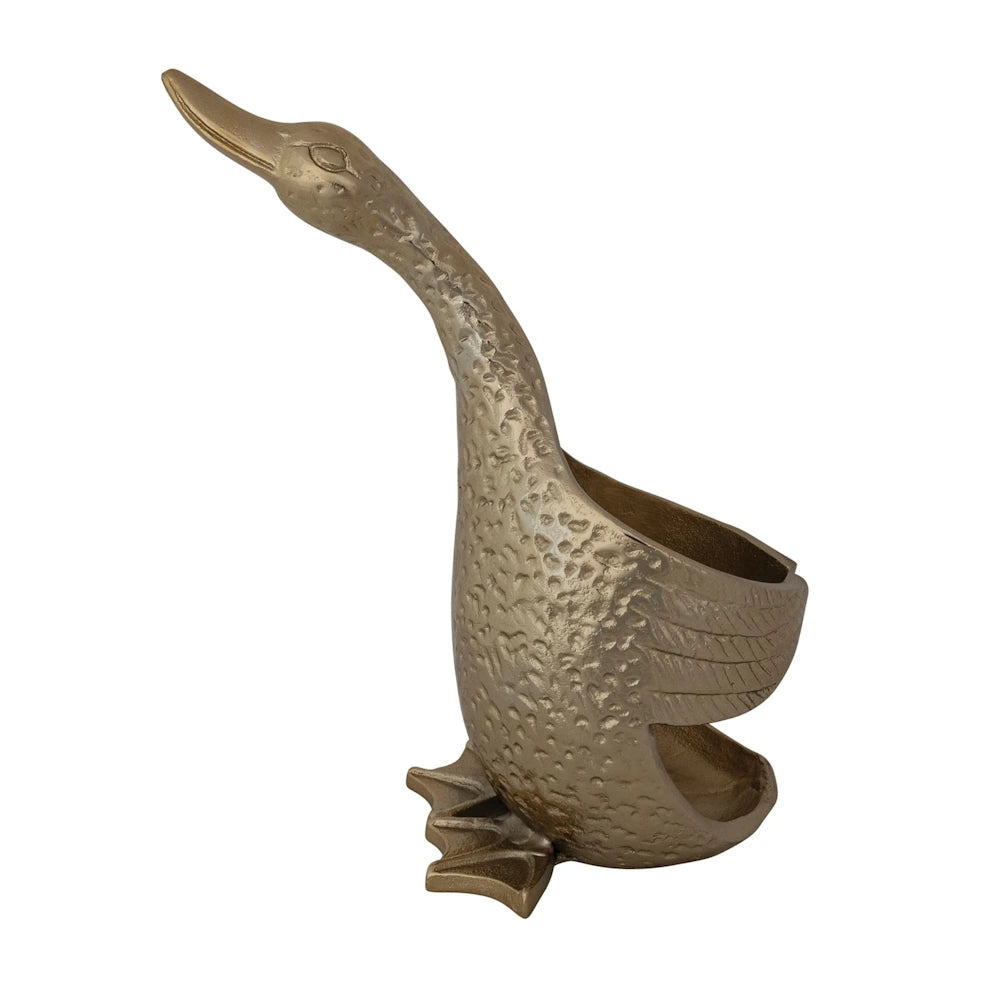 Side profile of a gold duck-shaped bottle holder with detailed feather texture, isolated on white.