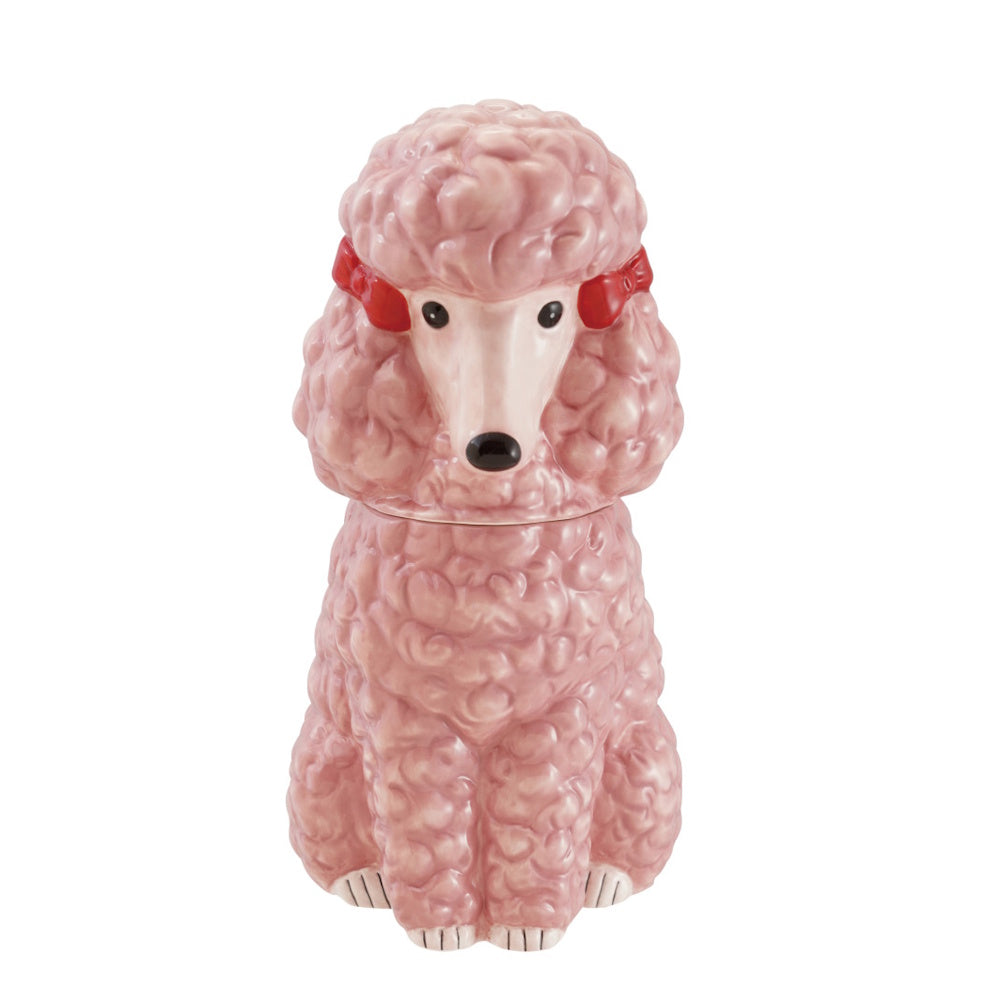 Pink ceramic poodle cookie jar with red bows.
