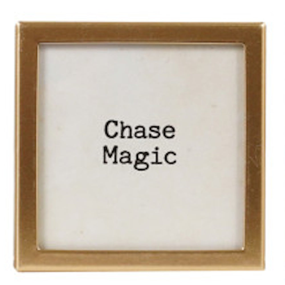 Square gold-framed magnet with text "Chase Magic".