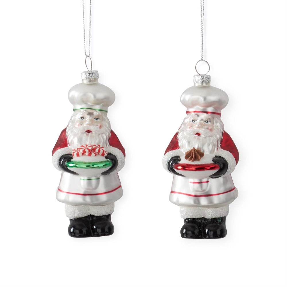 Two hanging Chef Santa blown glass ornaments.
