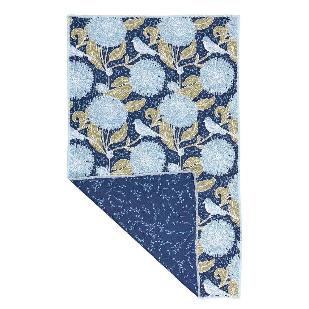 Blue and olive floral tea towel with bird pattern and a dark blue sprigged reverse side, partially folded.