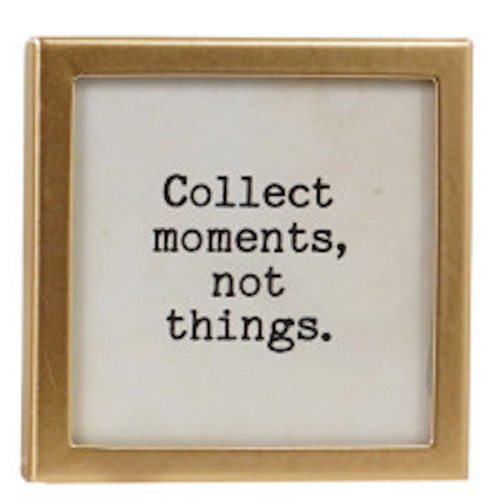 Square gold-framed magnet with text "Collect moments, not things."