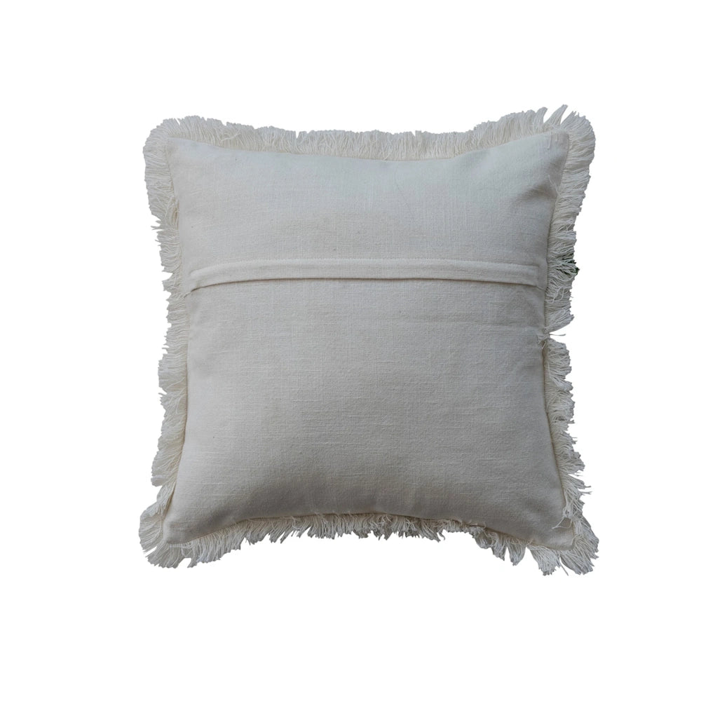 Back view of a plain off-white throw pillow featuring a hidden zipper closure and fringed edges.