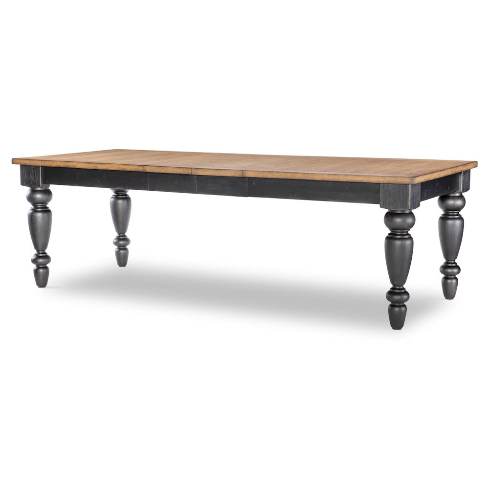 Rectangular dining table with natural wood top, black apron, and turned chimney-style legs in side view.