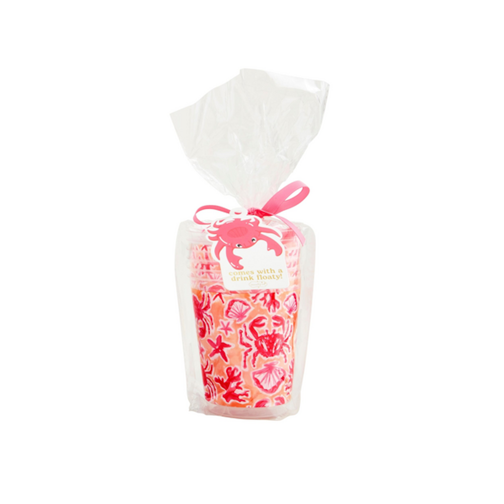 Stacked party cups with pink crab and seashell patterns in clear gift packaging with a pink ribbon.