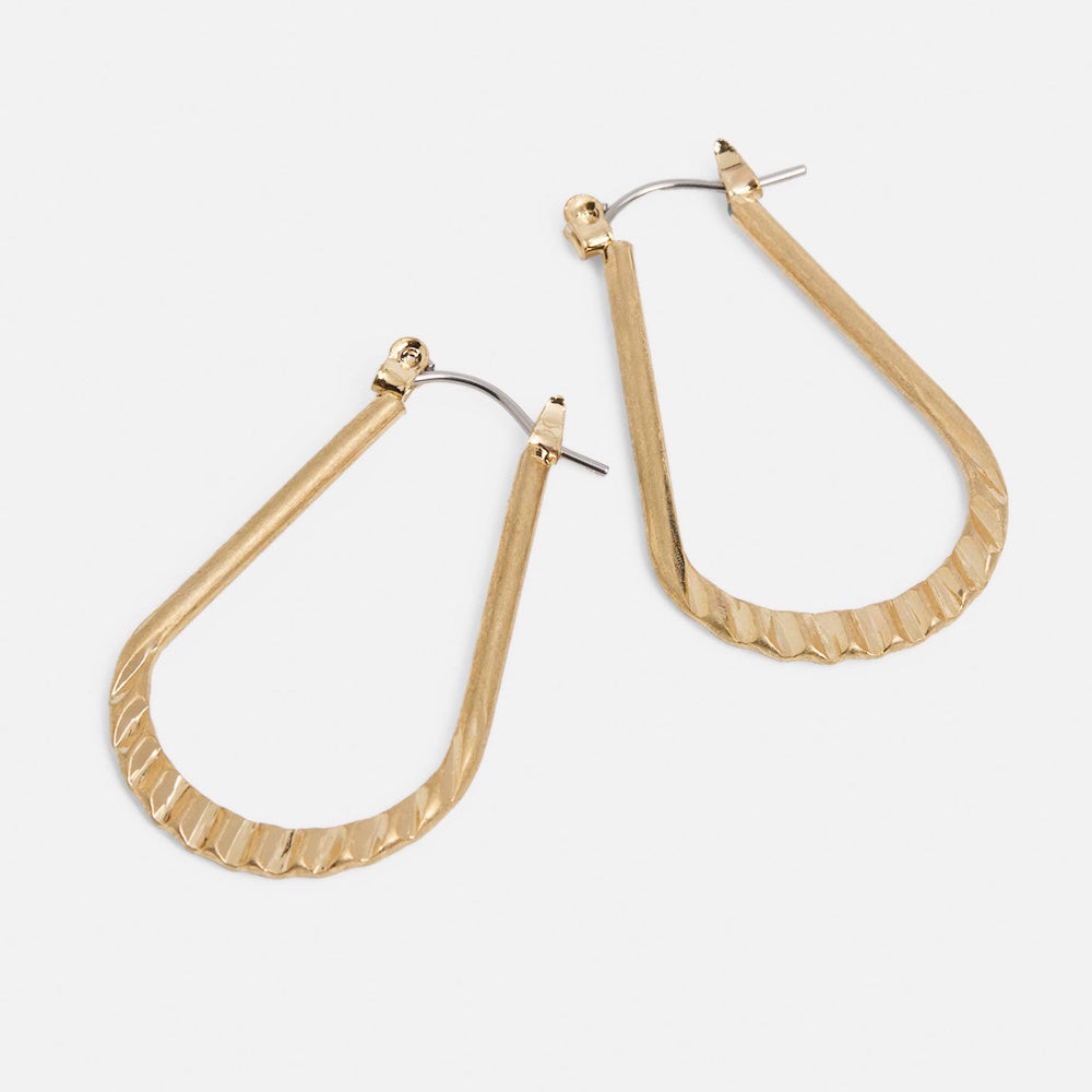 Gold crinkle teardrop dangle earrings with a textured finish and lever back closure on a white background.