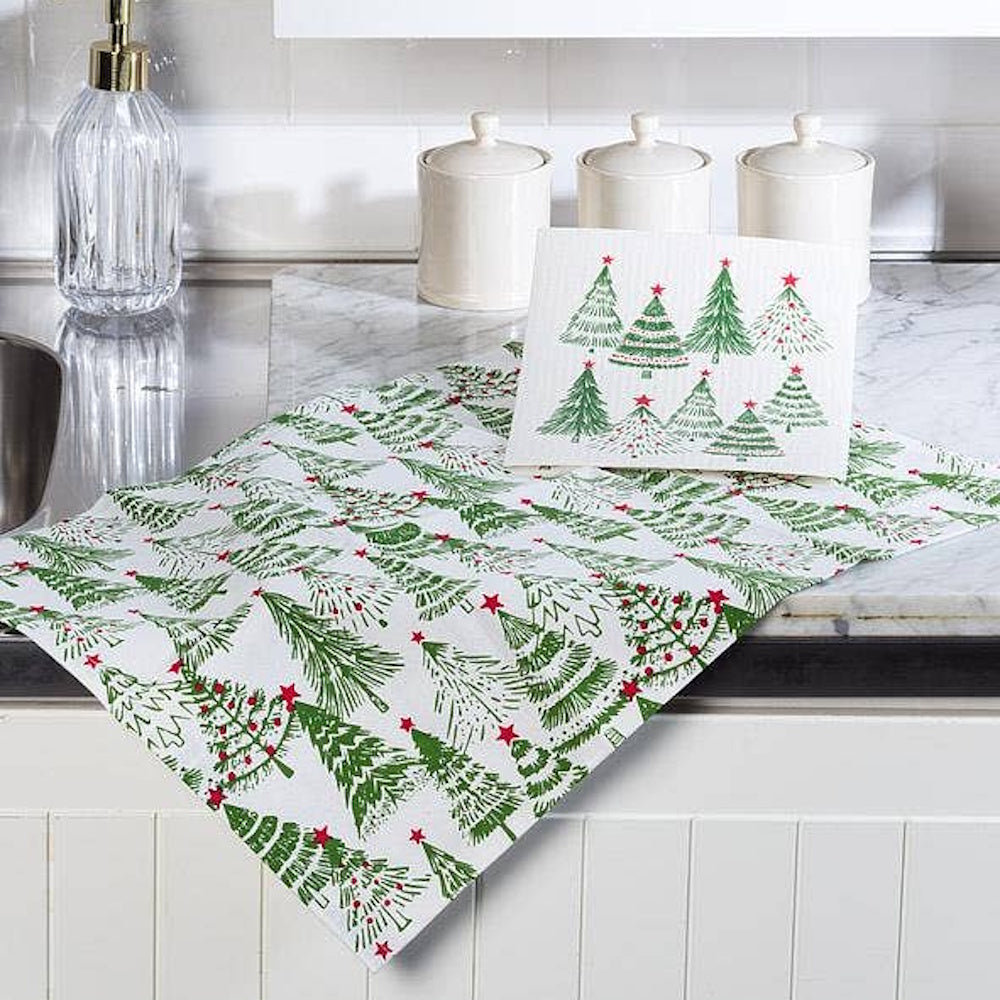 Holiday kitchen towel and dishcloth set printed with green and red Christmas trees.