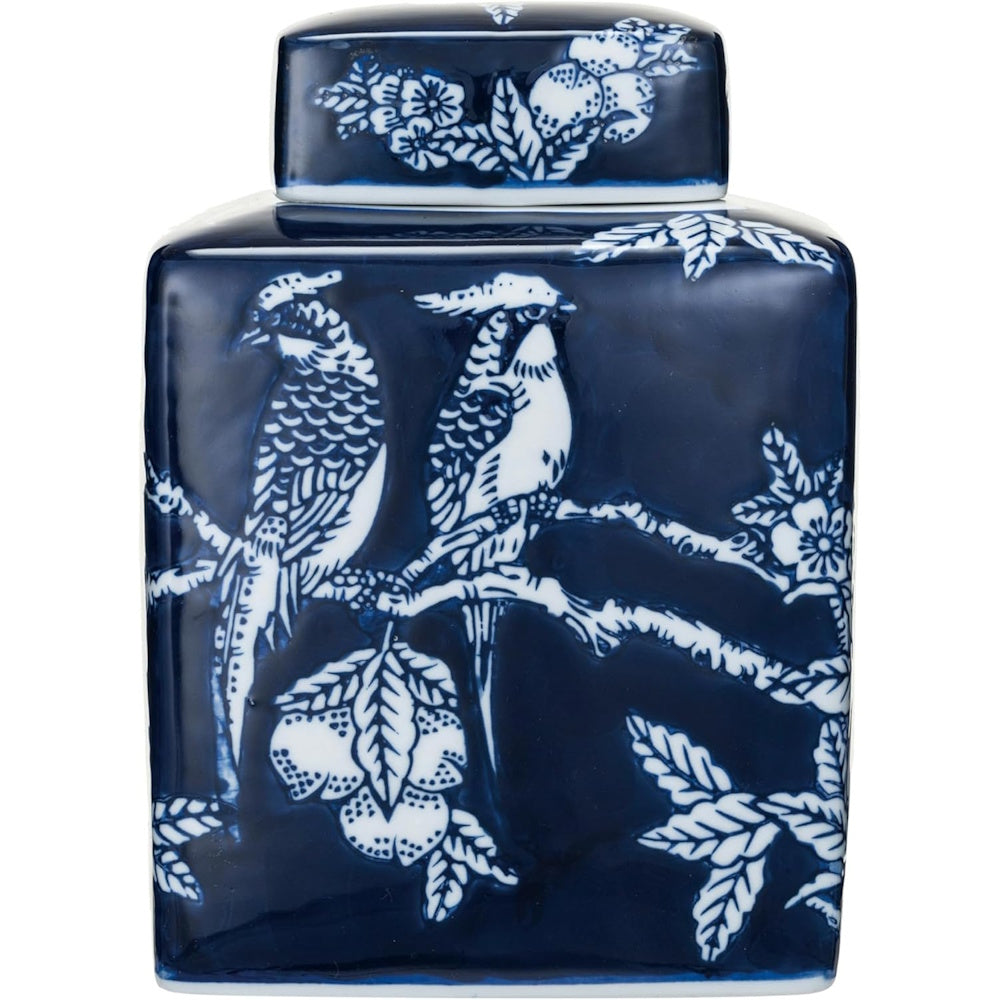 Square blue and white ceramic ginger jar with a lid, featuring two birds perched on branches with fruit.