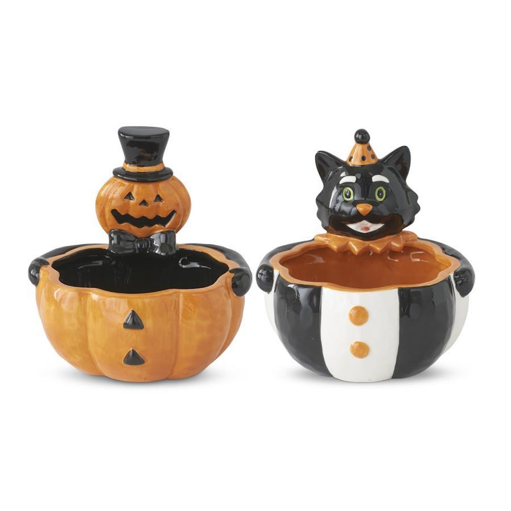 Two ceramic Halloween bowls shaped like a top-hat pumpkin and a party-hat black cat.